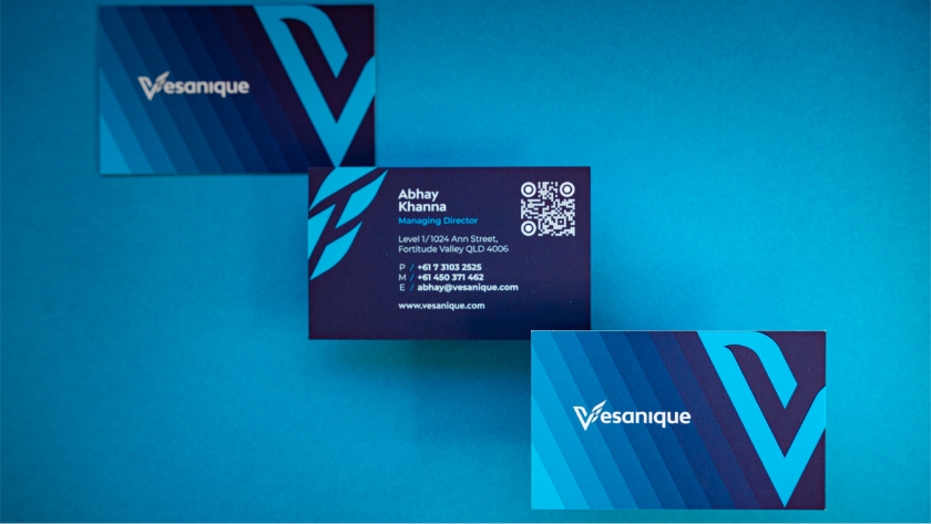 Plan photo of  Vesanique's blue name cards after rebranding