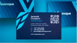 Back photo of  Vesanique's blue name cards after rebranding